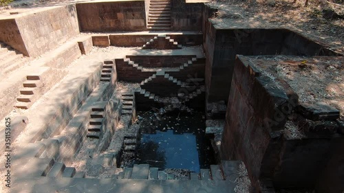 View of the step well at destroyed Shiva Temple at Polo Forest in Gujarat, India photo