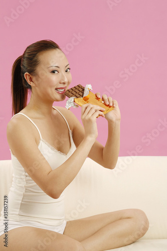 Woman with chocolate bar