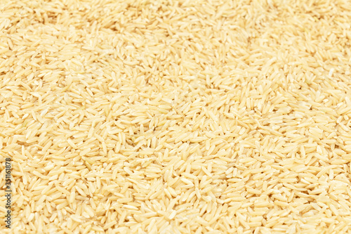 Texture of long brown rice. Side view.