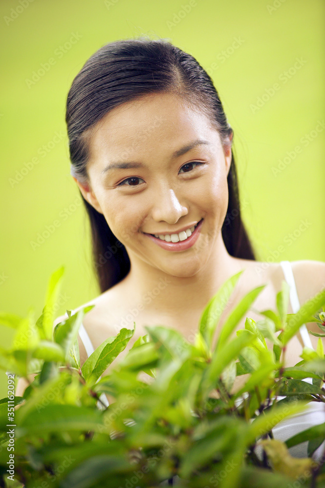 Woman flashing a genuine smile at the camera Woman flashing a genuine smile at the camera