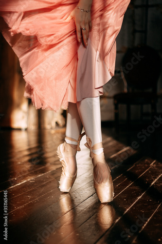 close-up of ballerina's feet in pointe shoes during dance