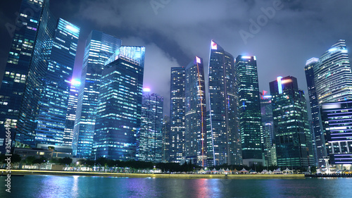 Sigapore Downtown Skyline at Night With Office Skyscrapers photo