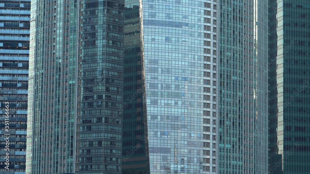 Obraz premium Exterior Glass Facade of Generic Modern Office Skyscraper Buildings in City