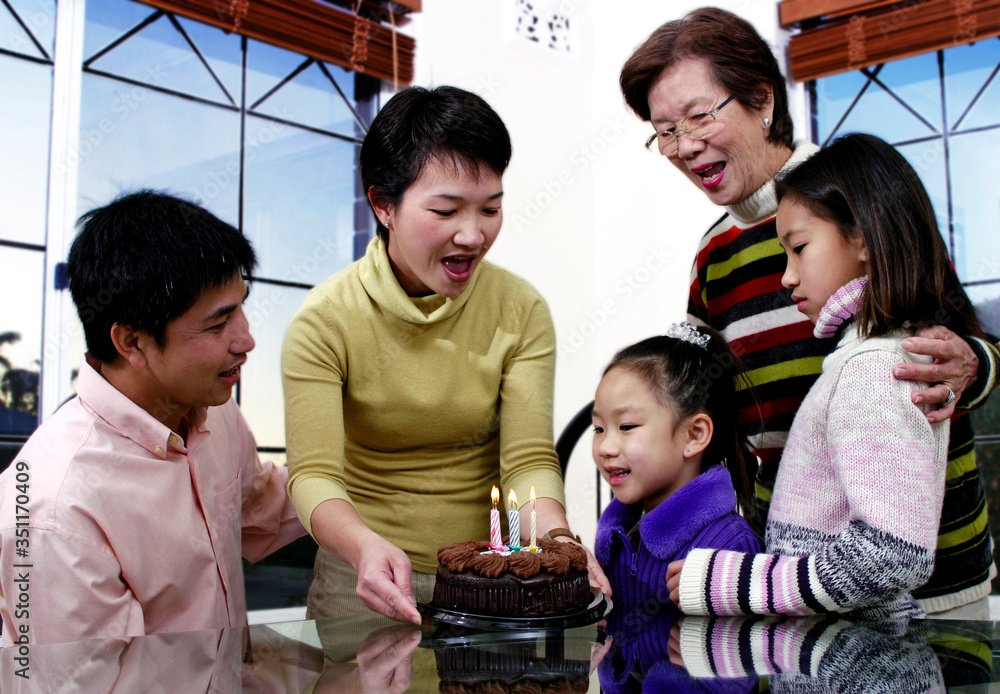 Girl celebrating her birthday with her family Girl celebrating her birthday with her family