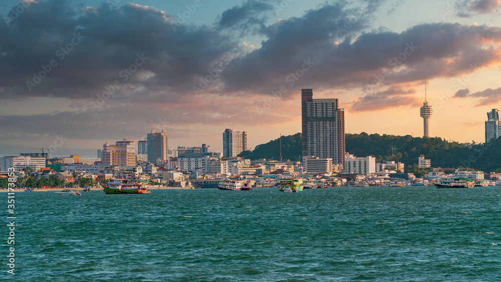 Sea scape and city scape with beautiful sky at golden hour time.