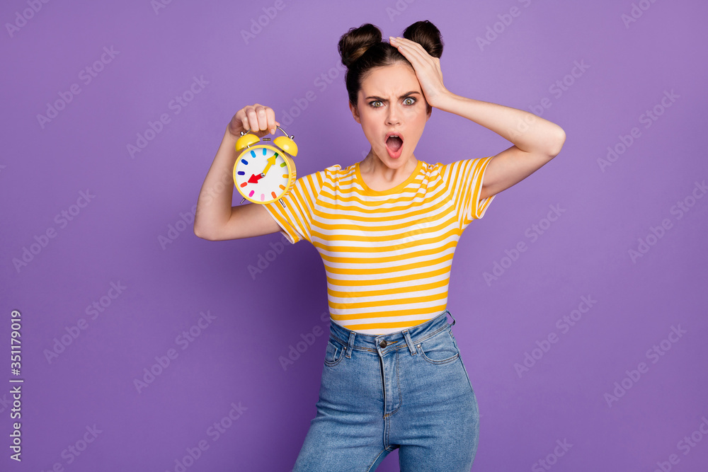 Portrait of her she nice attractive lovely pretty outraged girl holding in hand retro clock bad bedtime unhealthy isolated on bright vivid shine vibrant lilac violet purple color background