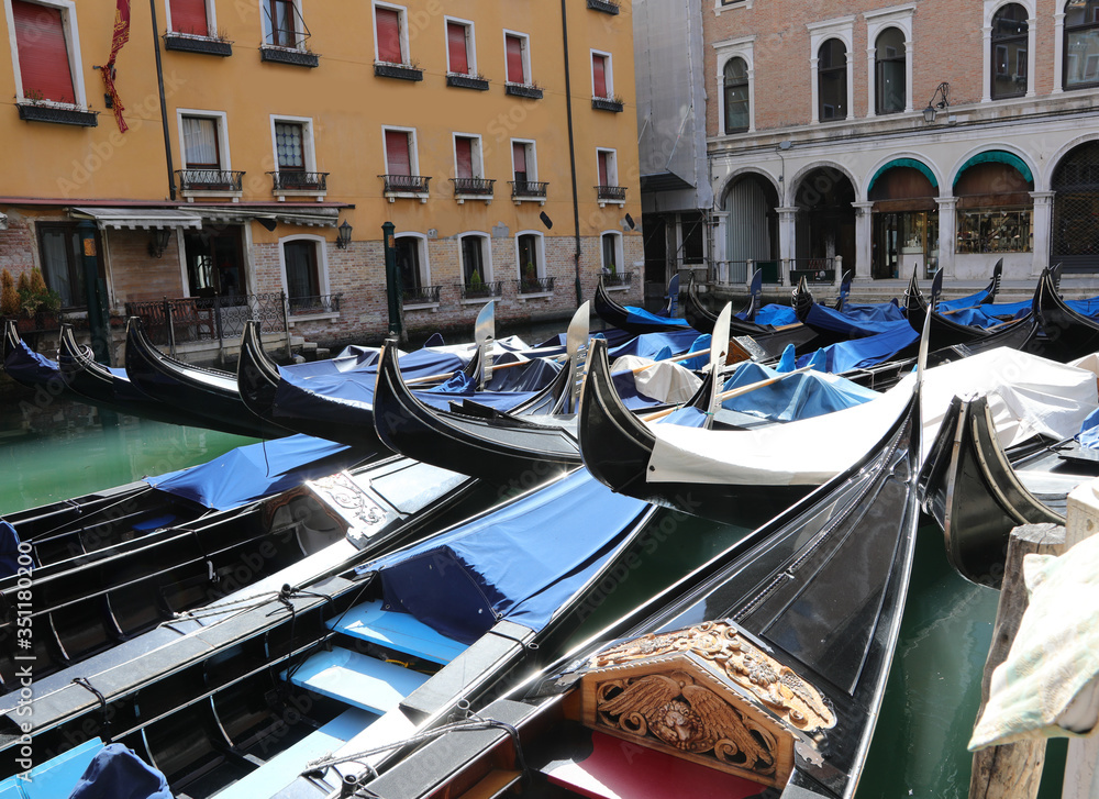 gondolas moored without tourists in Venice due to the Corona Vir