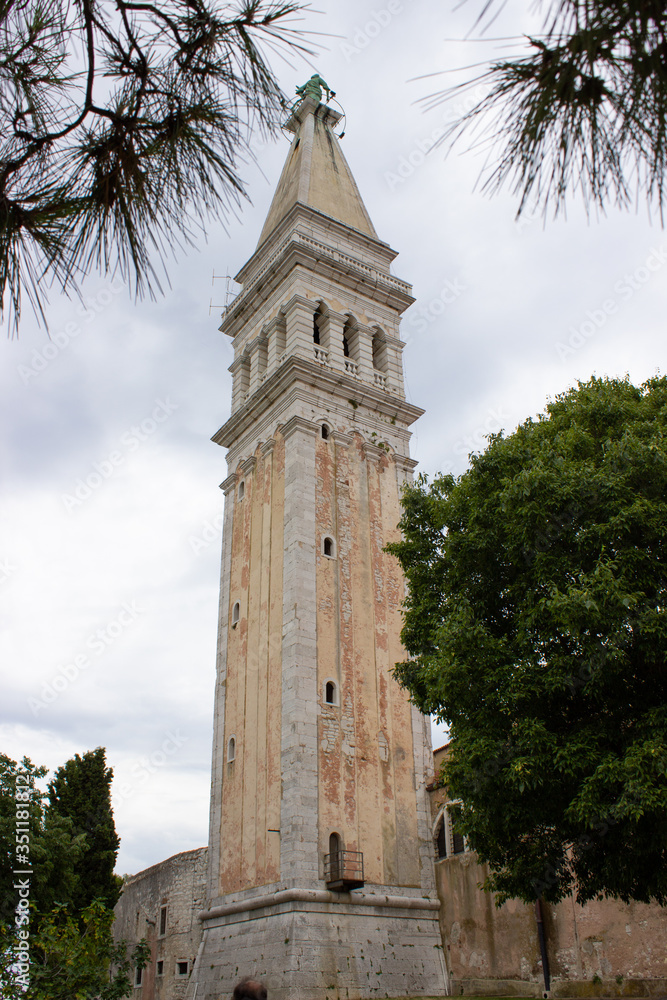 Vertical picture of the bell tower of the Church of St. Euphemia (also known as Basilica of St. Euphemia) in the old town of Rovinj, Croatia