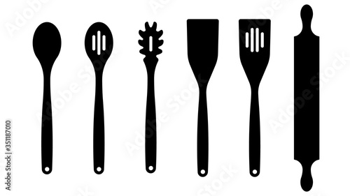 KITCHEN UTENSILS: baking spatula, skimmer spoon, scraper, serving and spaghetti spoon, rolling pin, vegetable wood spoon, spatula. Wooden kitchen accessories.