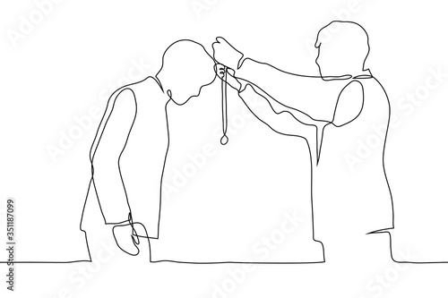 The silhouette of two men, one of which hangs a medal on a ribbon around the neck of another man. One continuous line drawing rewarding of a prize-winner (finalist, winner, athlete)