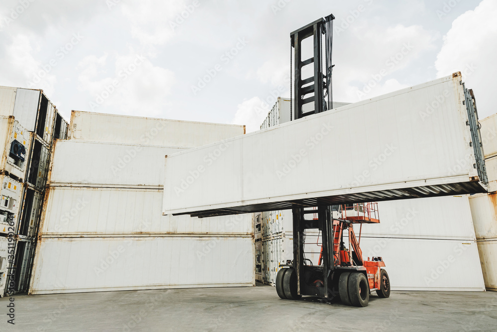 blank white shipping cargo container loading on forklift truck for transportation shipping and logistic at container cargo harbor, industrial, business logistics, import and export business concept
