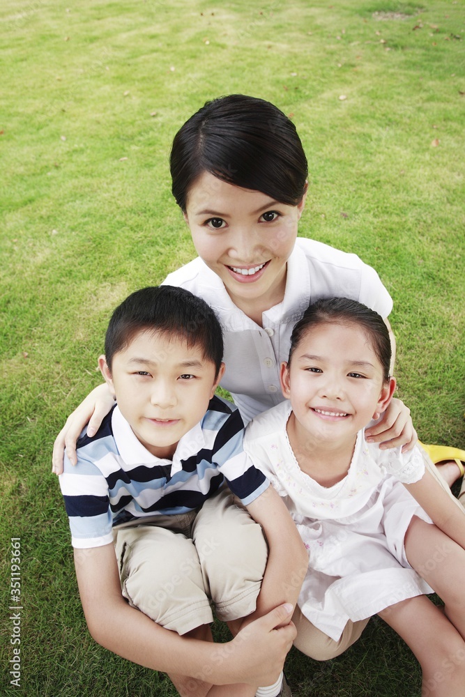 Mother and children in the park Mother and children in the park