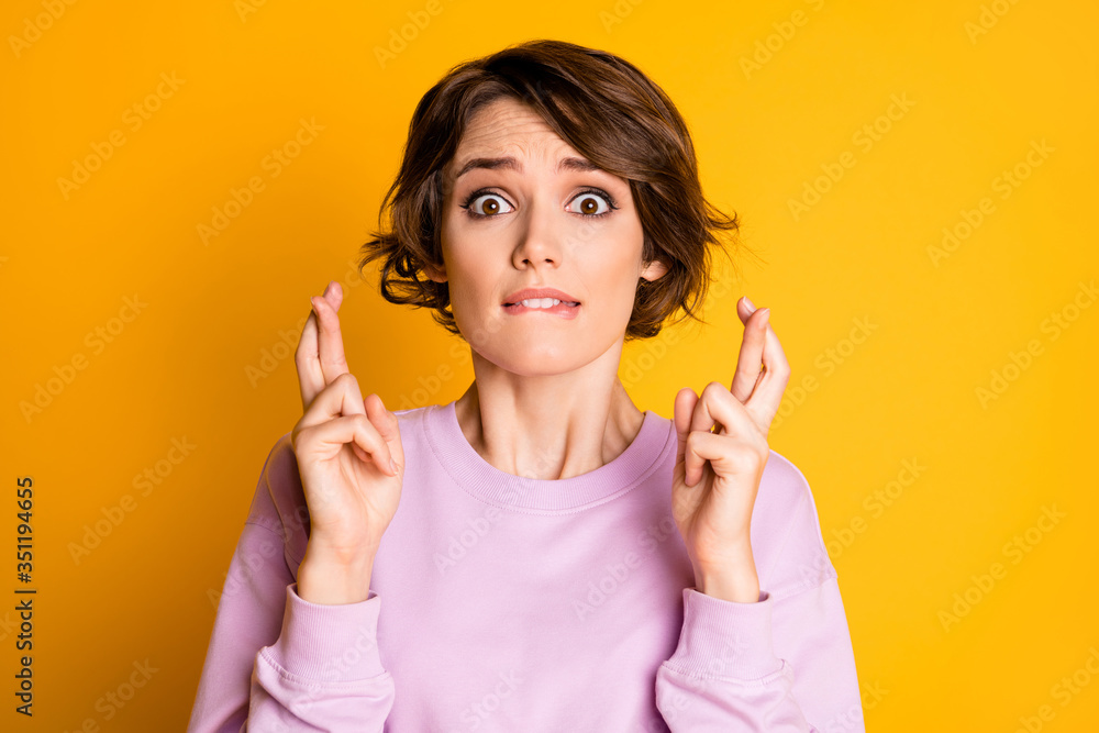 Close-up portrait of her she nice attractive lovely cute worried nervous girl biting lip expecting result news isolated on bright vivid shine vibrant yellow color background Close-up portrait of her she nice attractive lovely cute worried nervous girl biting lip expecting result news isolated on bright vivid shine vibrant yellow color background