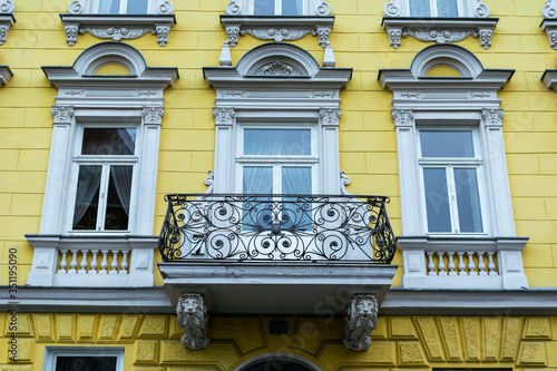 Facade of the old yellow house in Vienna, Austria