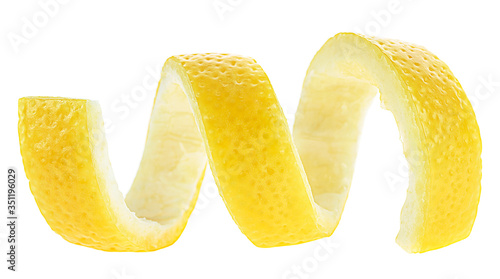 Spiral sliced lemon skin. Lemon twist or lemon peel isolated on a white background.