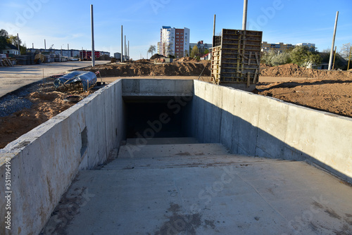 Wallpaper Mural Сonstruction of an underground pedestrian crossing at the intersection streets. Preparatory work for concreting and pouring the formwork. Foot tunnel and underground passage building Torontodigital.ca