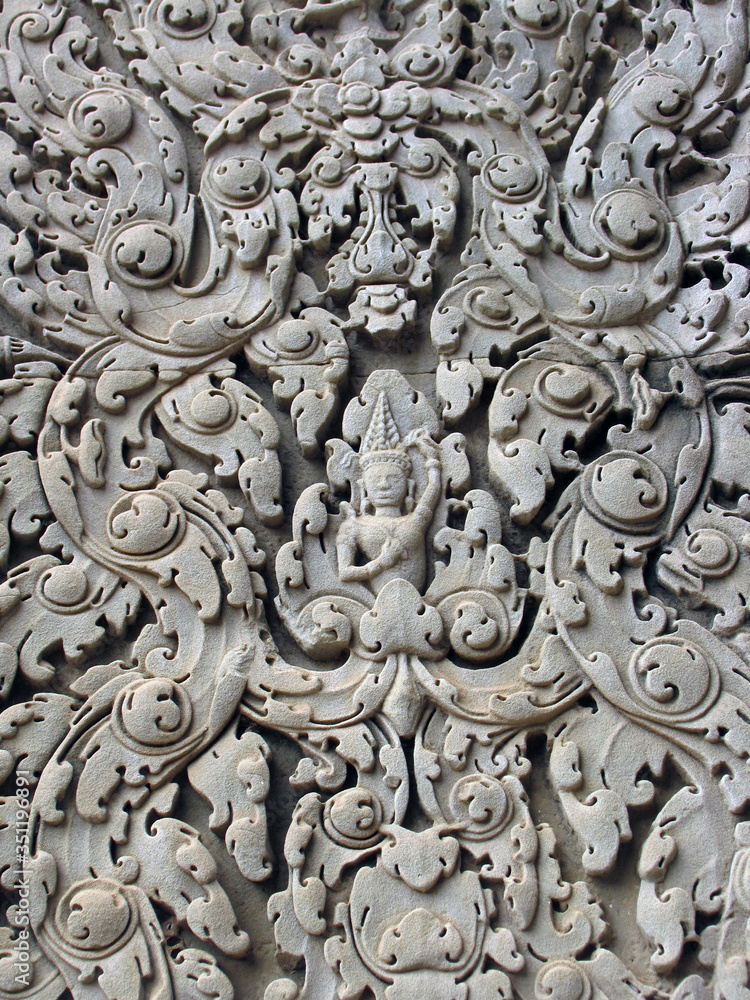 Stone carving on the wall of the temple of Angkor Wat, Cambodia