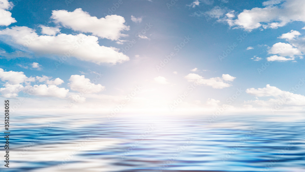 Sea landscape, sea surface. Blue sky, clouds, sunlight, rays. Empty natural scene in the open air. Blurred abstract background. Background of a sea landscape. Blue sky with clouds over the sea. 