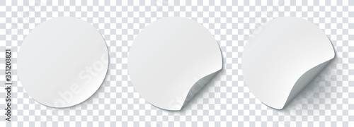 Mockup realistic paper round stickers white colors with curved corner and shadow. White round sticker on a transparent background. Vector illustration EPS10 photo