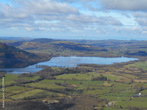 View of lake and fields in the Lake District