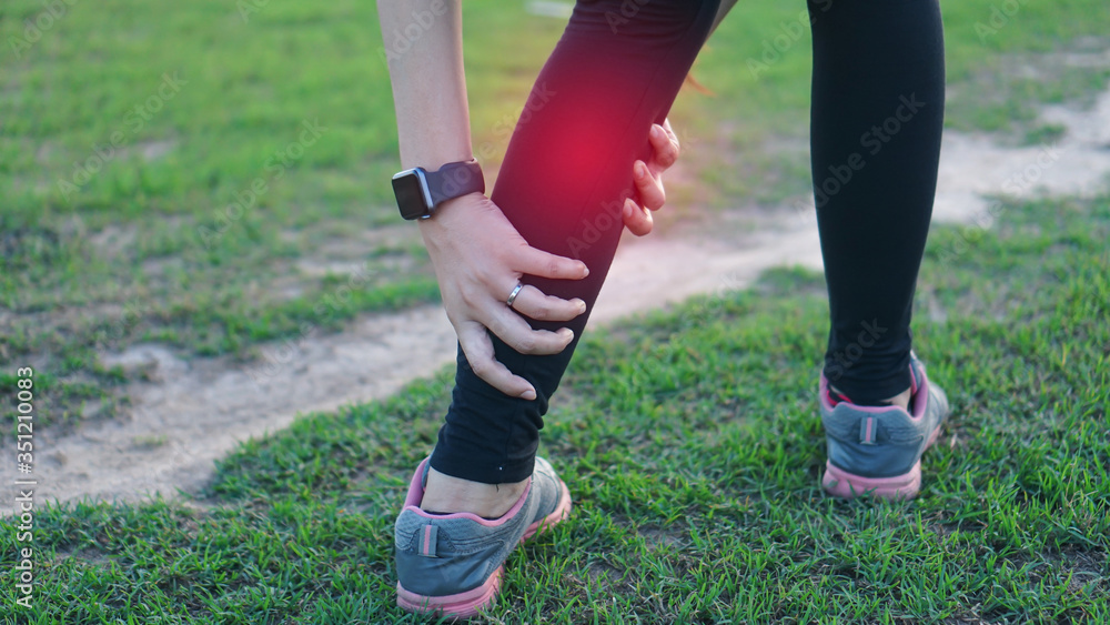 Calf leg injury accident in sport exercise running jogging.sprain or cramp Overtrained injured person when training exercising or running outdoors. Calf leg injury accident in sport exercise running jogging.sprain or cramp Overtrained injured person when training exercising or running outdoors.