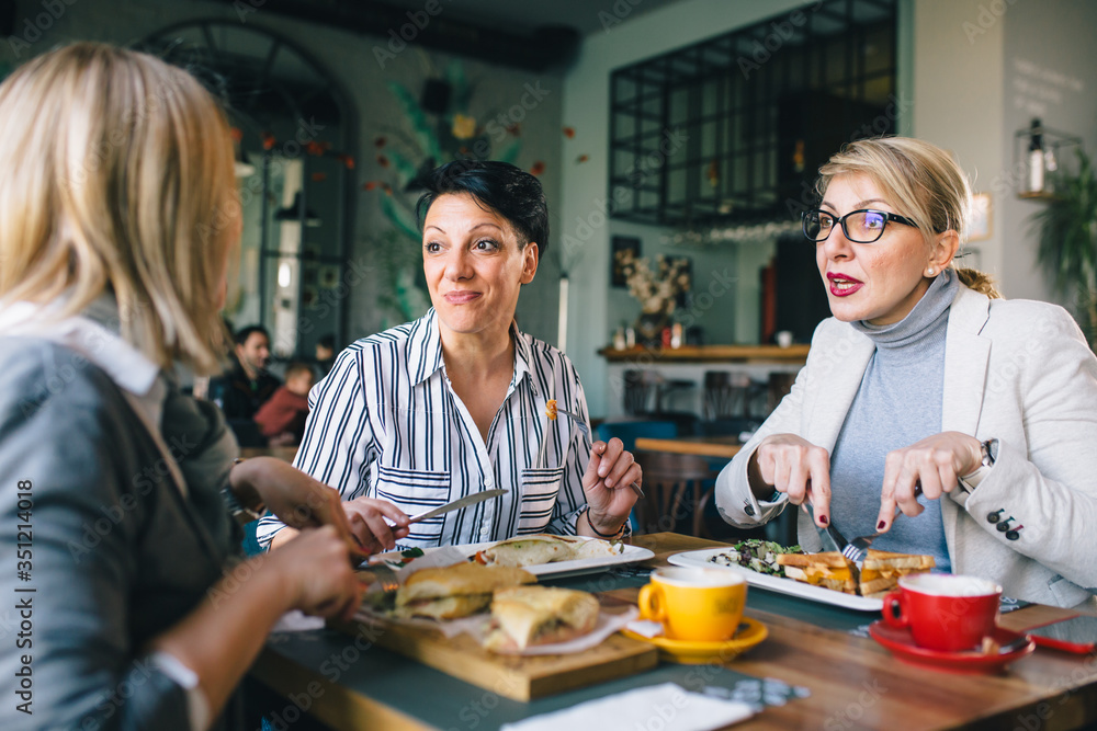 women having lunch or breakfast break at restaurant women having lunch or breakfast break at restaurant