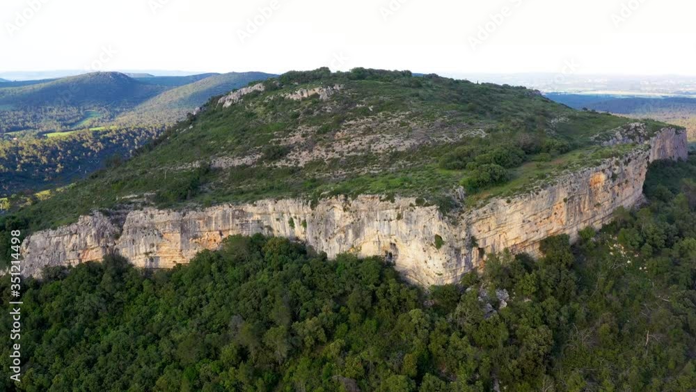 Aerial large vertical pan of a beautiful cliff, climbing spot Aerial large vertical pan of a beautiful cliff, climbing spot