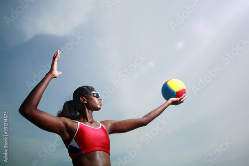 Woman playing beach volleyball © ImageHit