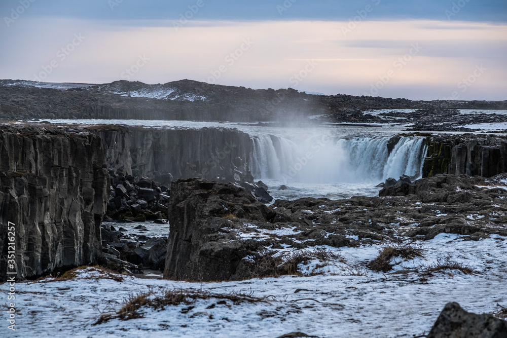 Selfoss waterfall in Northeast Iceland runs through a rock gorge Selfoss waterfall in Northeast Iceland runs through a rock gorge