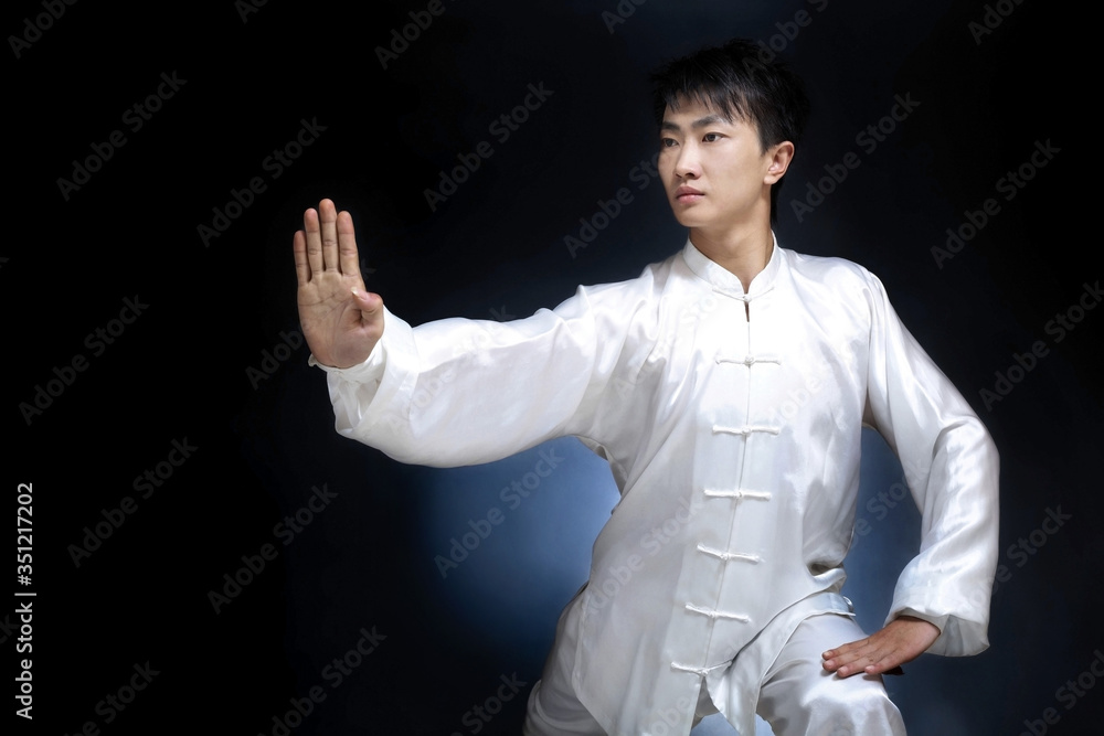 Man practising martial arts Man practising martial arts