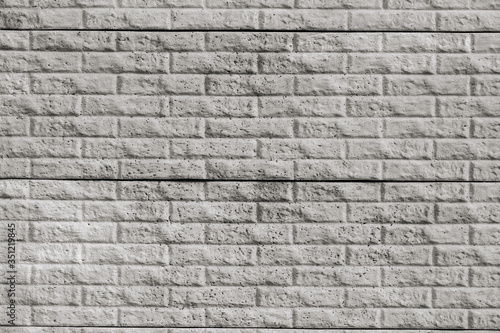 Decorative grey tiles brick wall texture 