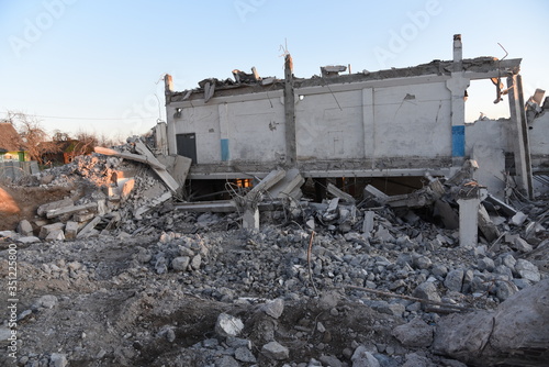 View of the demolition of a multi-storey building. Dismantling and demolition of buildings and structures. Destroy concrete