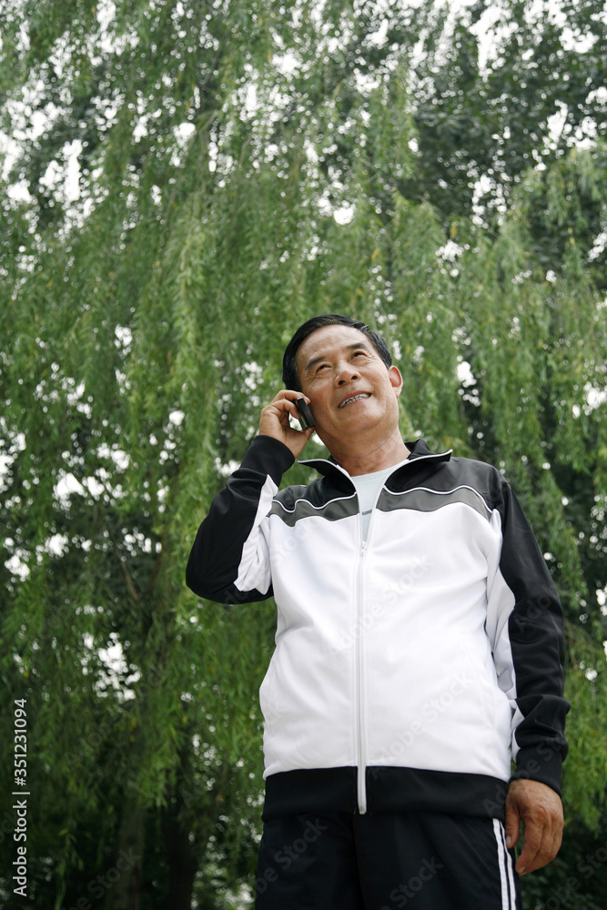 Senior man talking on the phone Senior man talking on the phone