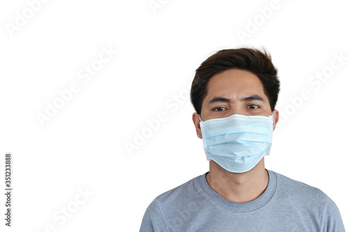 Asian man wear surgical mask to prevent air pollution , germs and coronavirus ,White background.