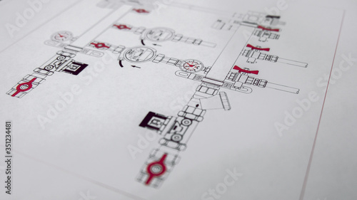 Engineering design of heating and water supply. Selective focus. Engineering drawing on white paper. Drawing of pipes and shut-off valves. The concept of the project design.