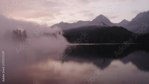 Mountain Lake with Flowing Fog