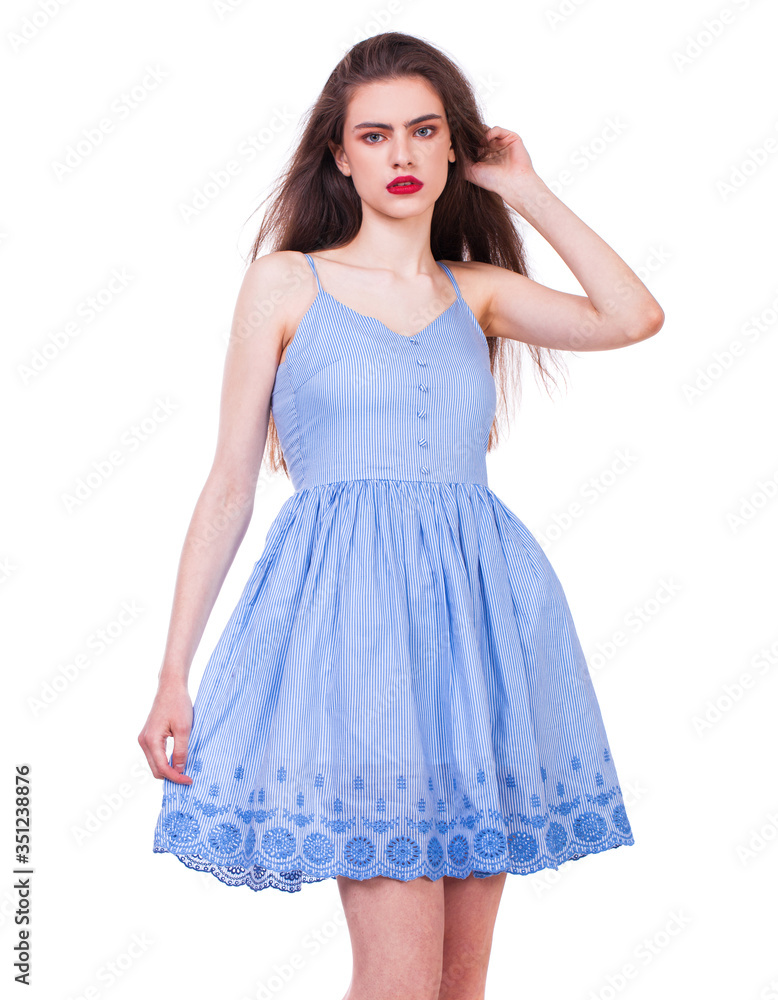 Fashion portrait of a young beautiful woman in dress Fashion portrait of a young beautiful woman in dress