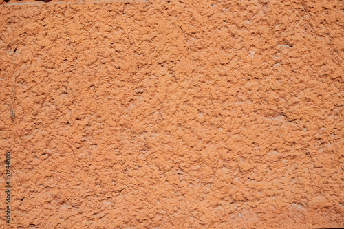 orange perforated cement wall loose