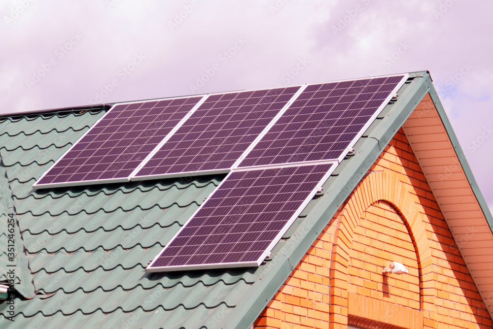 Solar panels on the roof of house.