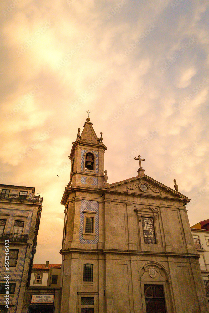 Church of Porto illuminated by the setting sun.