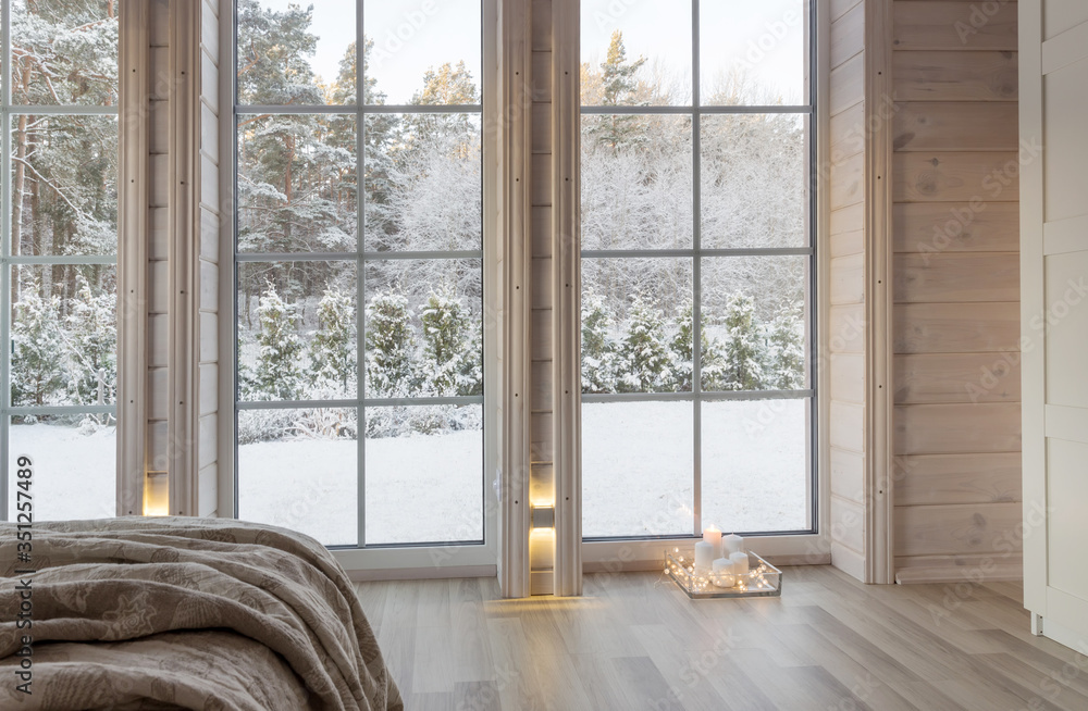 Fototapeta premium Bright photo studio interior with big window, high ceiling, white wooden floor