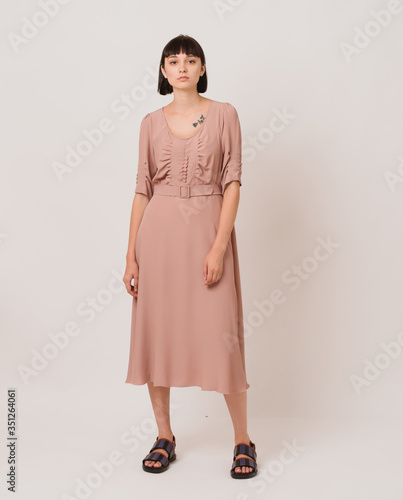 Fashion shooting in studio . Professional model, fashionable clothes and style, new collection. stylish look.