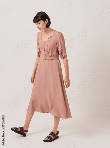 Fashion shooting in studio . Professional model, fashionable clothes and style, new collection. stylish look.