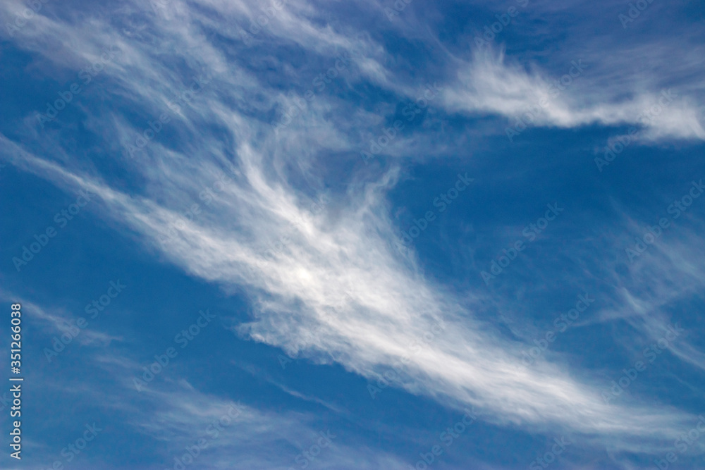 Light cirrus clouds on blue sky closeup Light cirrus clouds on blue sky closeup