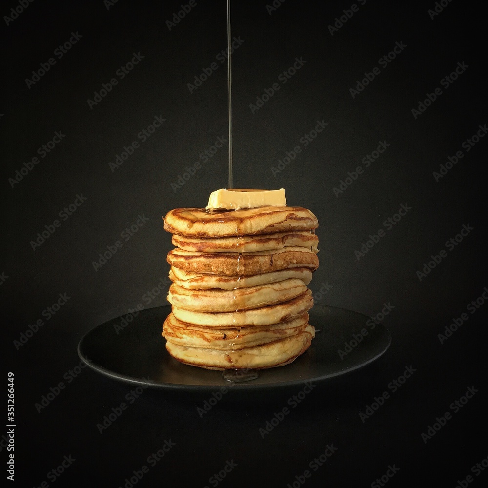 Close-up Of Maple Syrup Flowing Over Pancakes Stock Photo | Adobe Stock