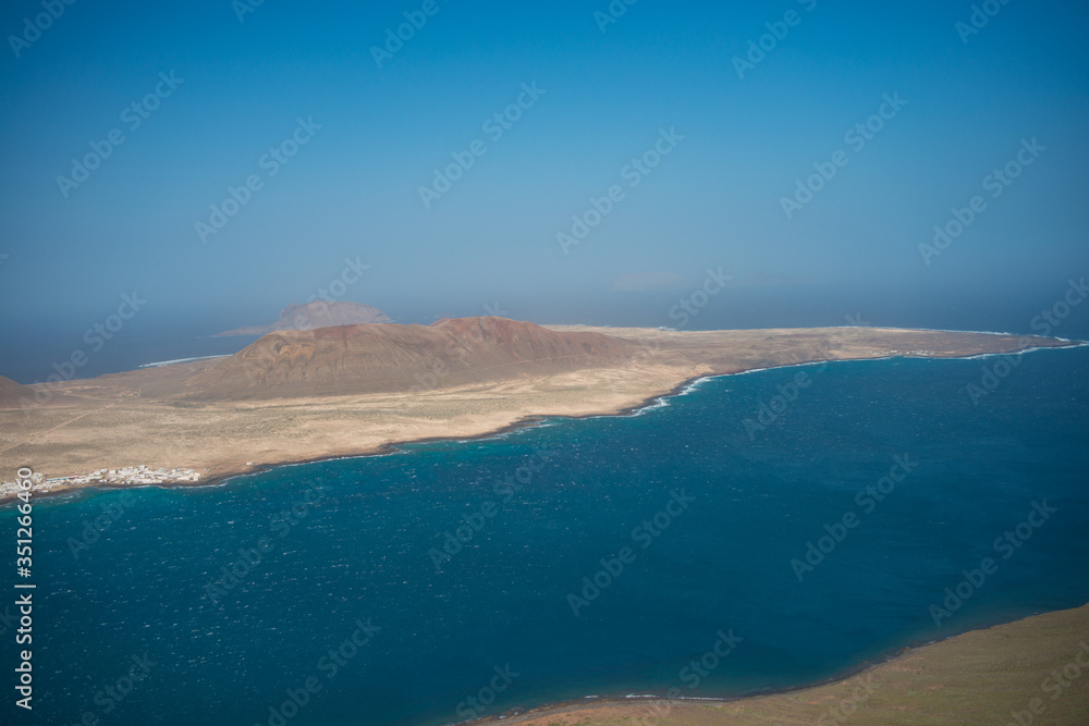 Aerial view on the coastline of Lanzarote island on a sunny day 