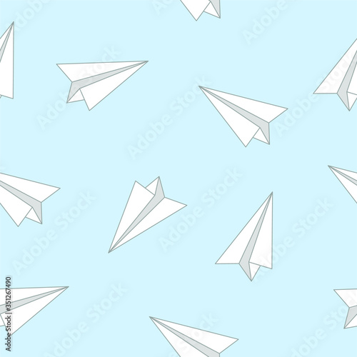 Paper airplanes, geometric seamless pattern on a blue background. 