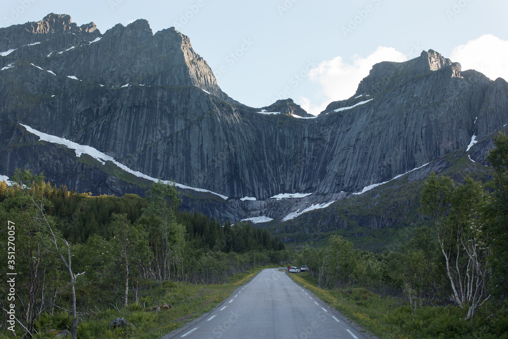 The scenic mountain road to Nusfjord in Lofoten. 