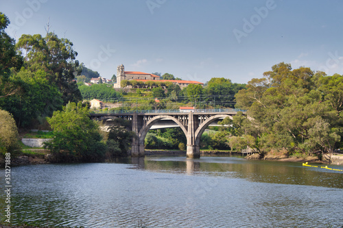 Lerez river bridge and San Salvador de Lerez monastery photo