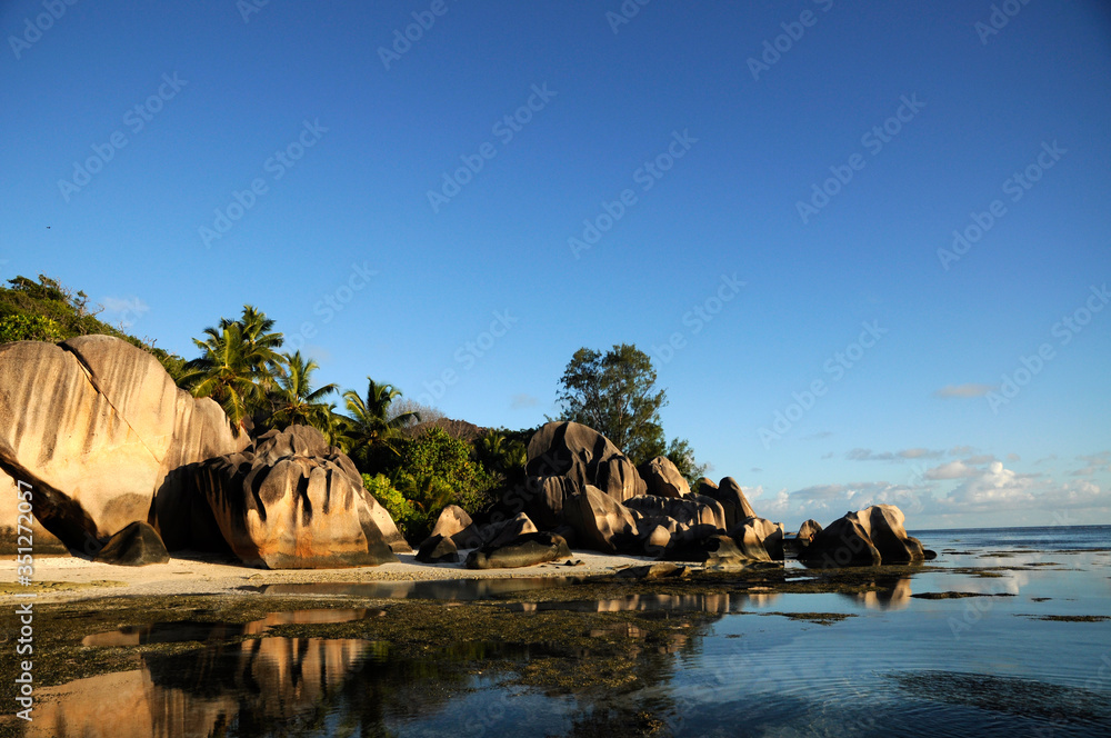 Idyllic beach with granitic rocks in Anse D'argent, La Digue island, Seychelles
